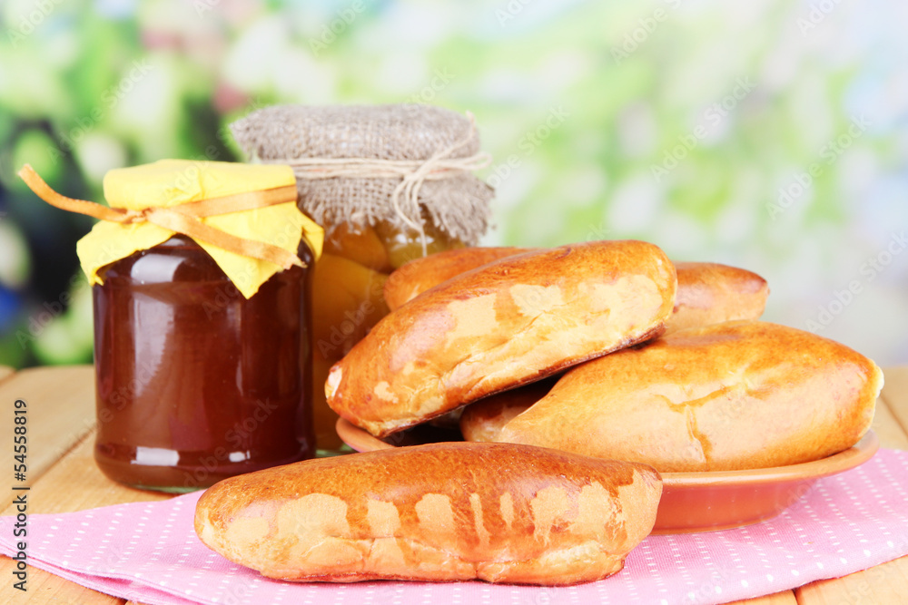 Fresh baked pasties with fruit jam,