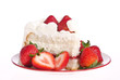 Slice of homemade strawberry whipped cream cake