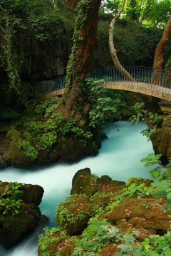 waterfall landscape with bridge on it