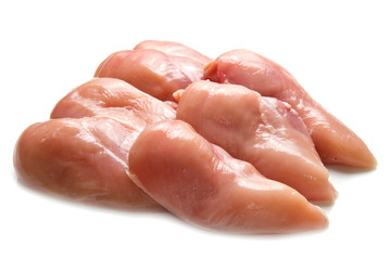 raw chicken fillets close up on white