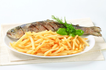 Wall Mural - Grilled trout with French fries