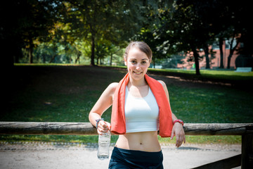 Wall Mural - beautiful woman fitness relaxing after sport