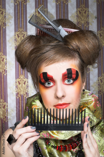 Nowoczesny obraz na płótnie Woman with combs.