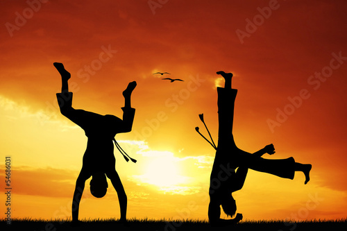 Fotoboard na płycie Capoeira o zachodzie słońca