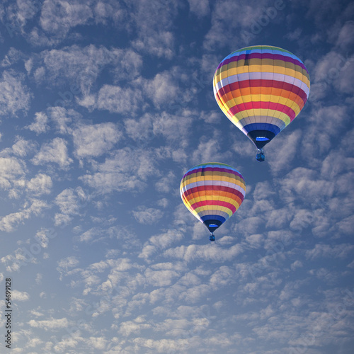 Obraz na płótnie canvas czteroczęściowy "tetraptyk" Balon na gorące powietrze na chmurze