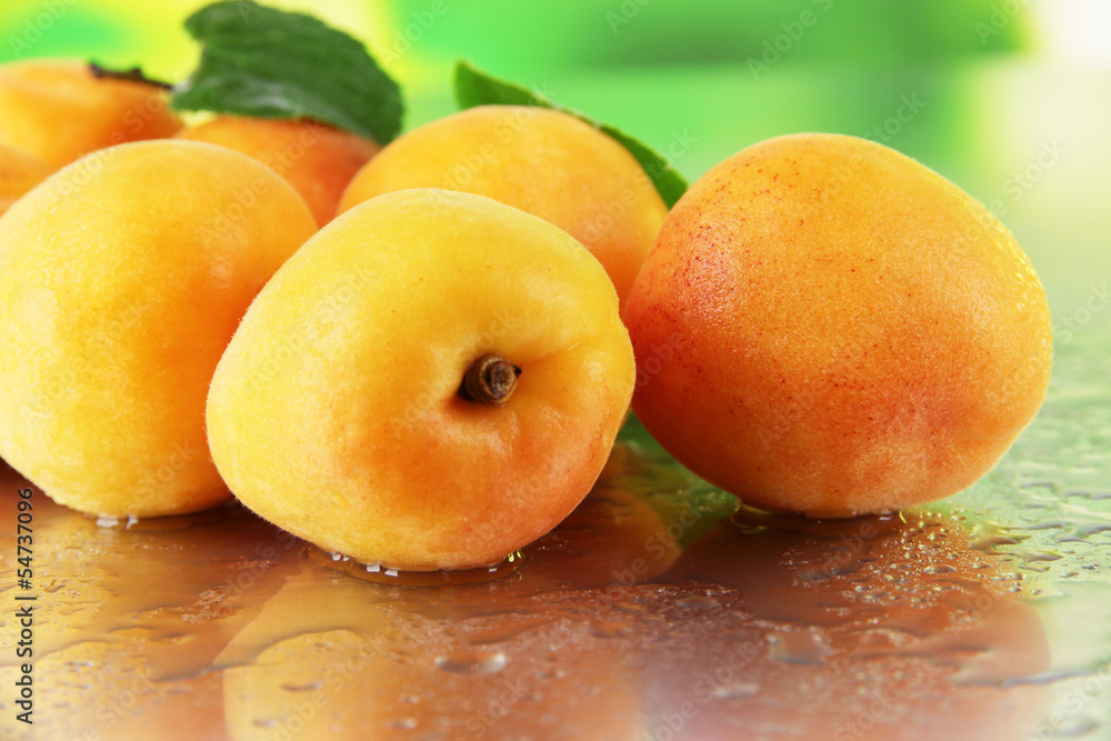 Apricots on nature background