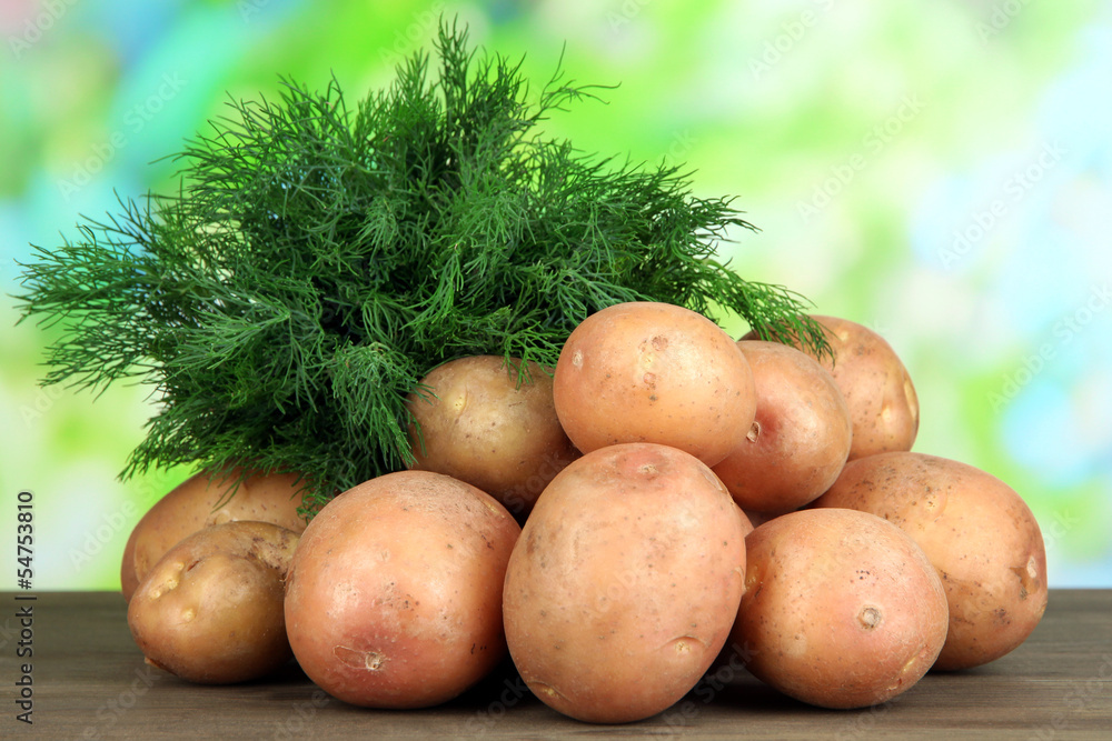 Potato on wooden table