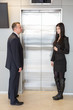 © Pavel Losevsky - Colleagues in business suits waiting for elevator