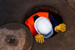 Worker Going Down The Manhole