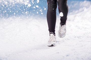 Woman running in winter