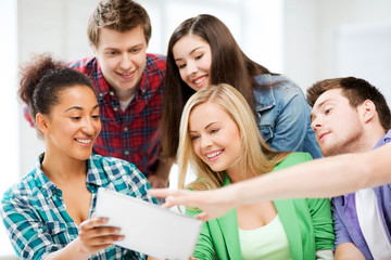 Poster - students looking at tablet pc at school