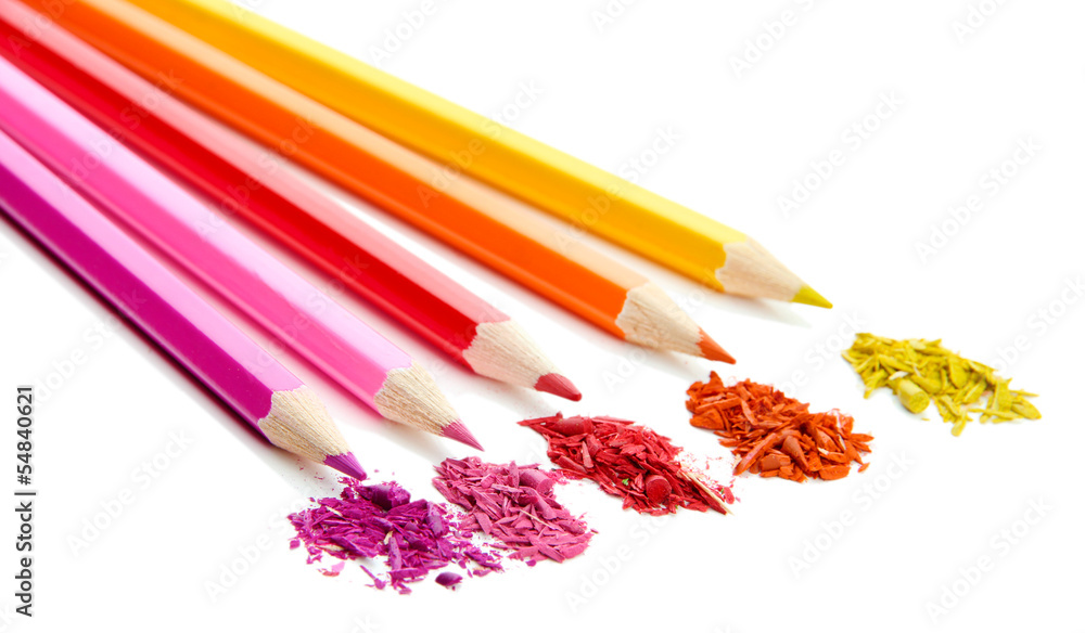 Colour pencils with sharpening shavings isolated on white