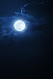 Fototapeta Niebo - Dramatic Nighttime Clouds and Sky With Beautiful Full Blue Moon