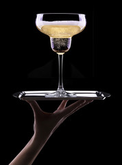 glass of champagne isolated on black background