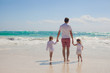 © travnikovstudio - Back view of happy father and his adorable little daughters