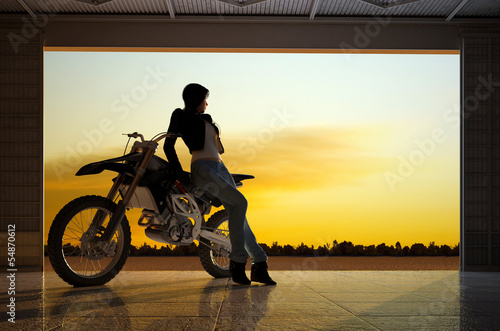 Obraz w ramie A girl and a motorcycle