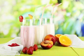 Canvas Print - Delicious milk shakes with strawberries and peach