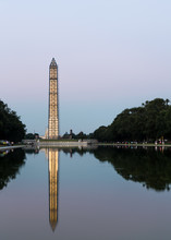 Washington Monument Reflecting At Night