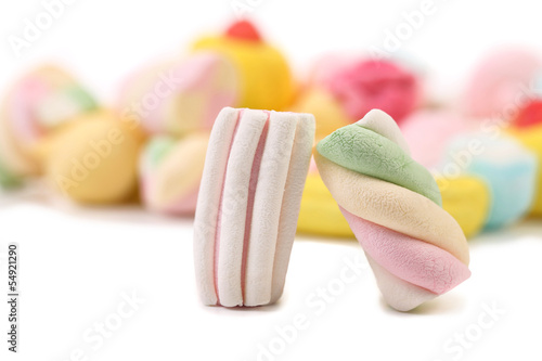 Obraz w ramie Two colourful marshmallow on background of other.