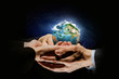© Sergey Nivens - Earth planet in hands