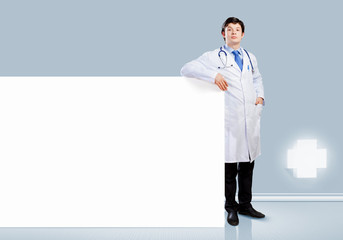 Wall Mural - Male doctor with banner