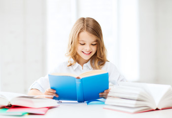 Canvas Print - student girl studying at school