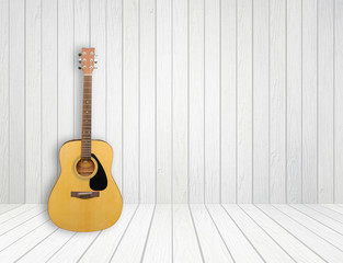 Guitar in white wood room