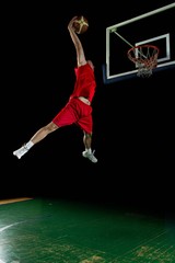 Wall Mural - basketball player in action