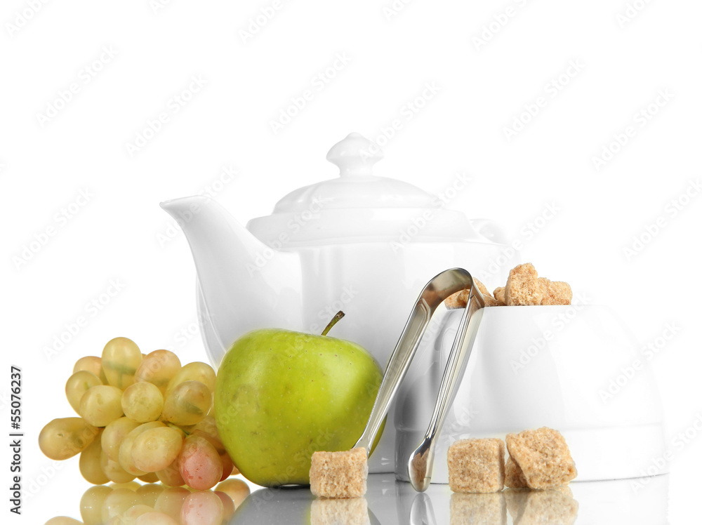Unrefined sugar in white sugar bowl on white background