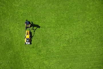 a man mowing the lawn