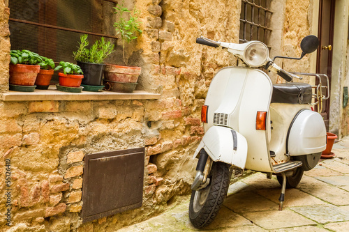 Fotomural Vintage scene with Vespa on old street