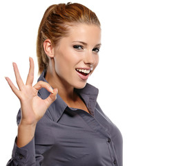 Wall Mural - Happy smiling business woman with thumbs up gesture