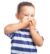 © asierromero - child covering his mouth on a white background