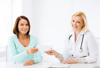 Sticker - doctor giving prescription to patient in hospital