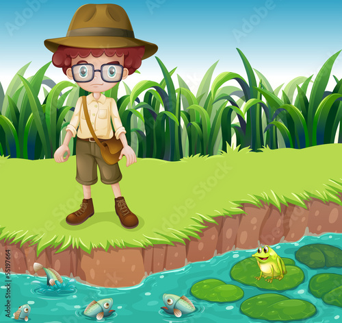 Foto-Banner -  A serious looking boy at the riverbank (von GraphicsRF)