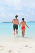 © .shock - happy young couple have fun on beach