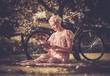 © Nejron Photo - Blond beautiful retro woman reading book