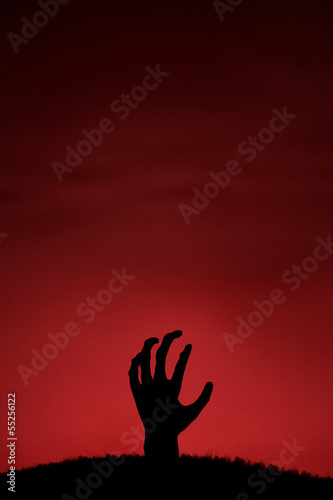Fotoboard na płycie Zbliża się ręka zombie