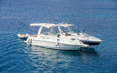 Two boats on blue water