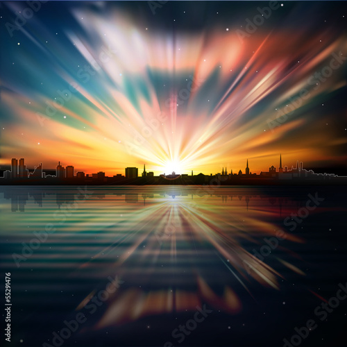 Naklejka ścienna abstract background with silhouette of city and sunrise