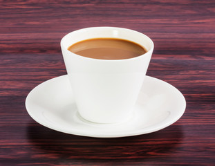 Coffee cup on wood table