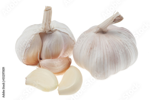 Fotografía Garlic head and cloves on white background