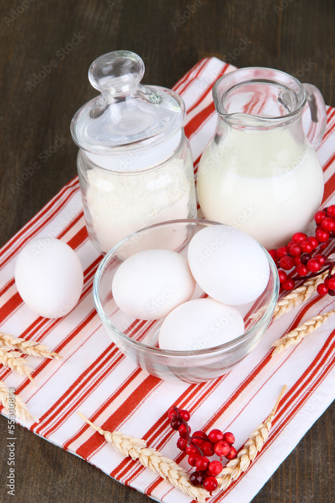 Ingredients for dough on wooden table close-up