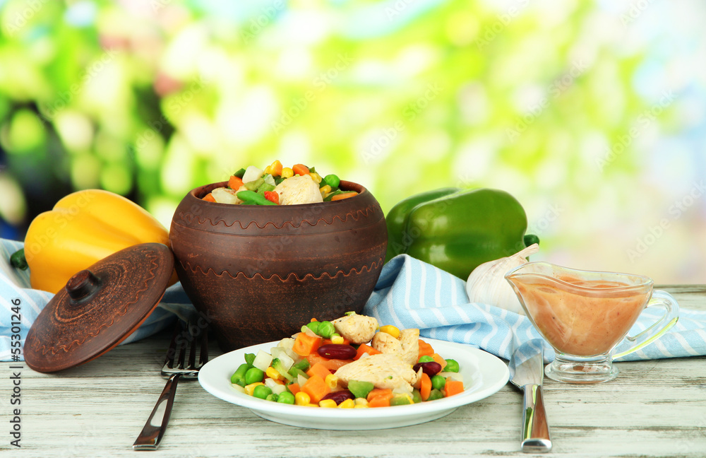 Baked mixed vegetable with chicken breast in pot,