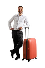 Canvas Print - happy man standing with suitcase