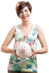 Canvas Print - Happy woman with a piggy bank