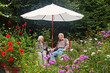 © Ingo Bartussek - aged couple on the garden bench