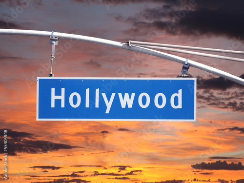 Tapeta ścienna Hollywood blvd napowietrznych znak drogowy z zachodem słońca niebo