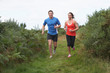 © micromonkey - Couple On Run In Countryside