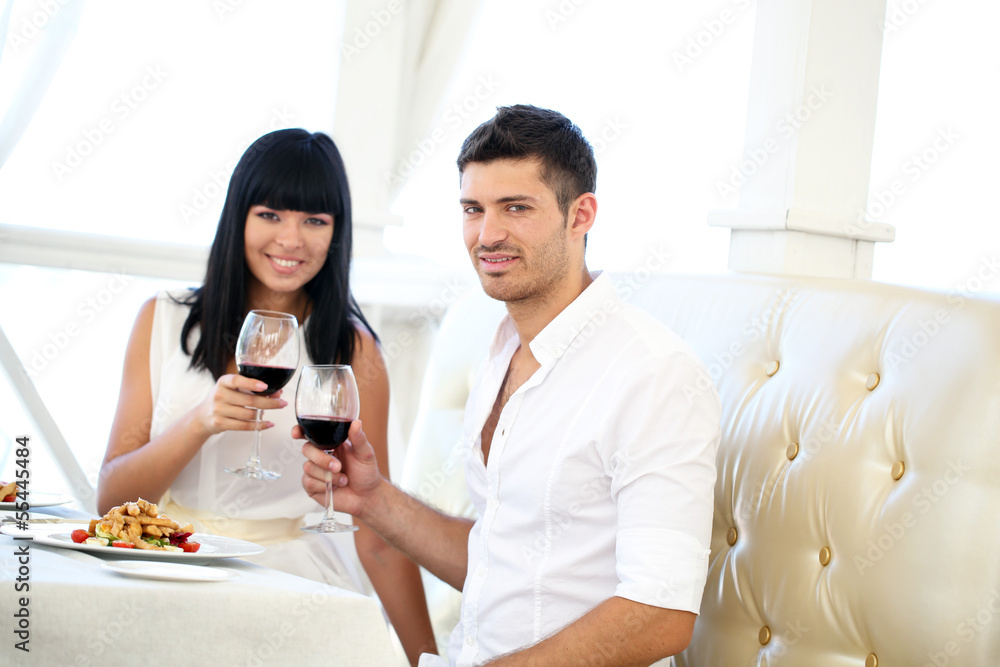 Beautiful couple having  romantic dinner at restaurant